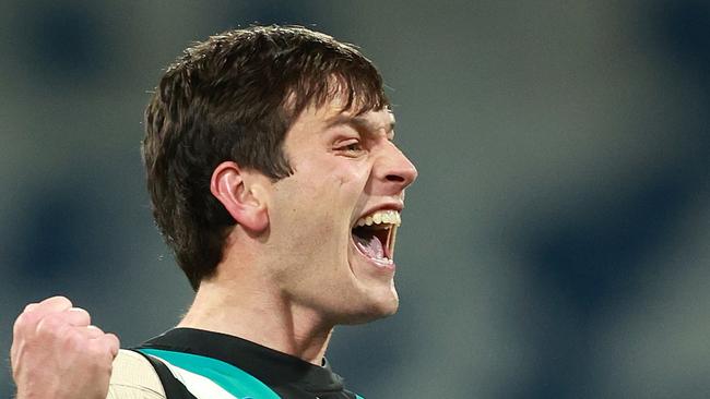 GEELONG, AUSTRALIA – AUGUST 05: Zak Butters of the Power celebrates kicking a goal during the round 21 AFL match between Geelong Cats and Port Adelaide Power at GMHBA Stadium, on August 05, 2023, in Geelong, Australia. (Photo by Kelly Defina/Getty Images)