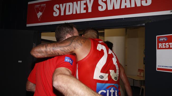 Swans coach John Longmire has a hug with Lance Franklin after the win. Pic: AAP 