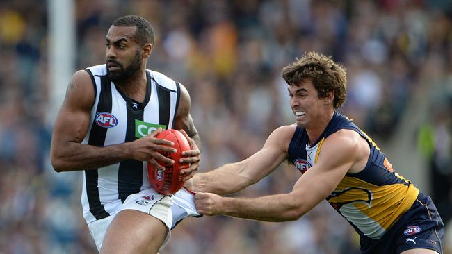 AFL Round 20 - West Coast Eagles vs Collingwood Pies at Patersons Stadium, Perth. Photo by Daniel Wilkins. PICTURED- Collingwood's Heritier Lumumba is tackled by Eagle Jamie Cripps.