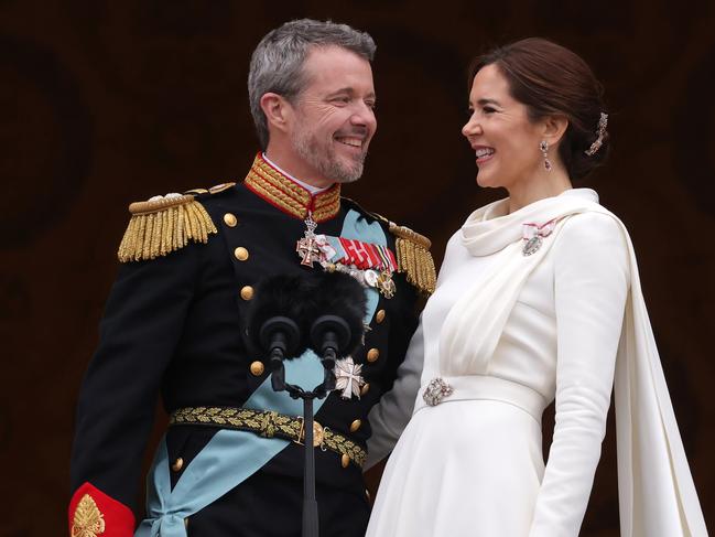 COPENHAGEN, DENMARK - JANUARY 14: Danish King Frederik X and wife Queen Mary of Denmark after his proclamation by the Prime Minister, Mette Frederiksen on the balcony of Christiansborg Palace on January 14, 2024 in Copenhagen, Denmark. King Frederik X is succeeding Queen Margrethe II, who will be stepping down after reigning for 51 years. (Photo by Sean Gallup/Getty Images)