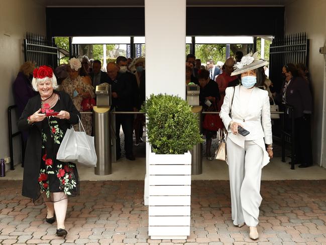 Racegoers arrive at the track for ladies’ day. Picture: Darrian Traynor