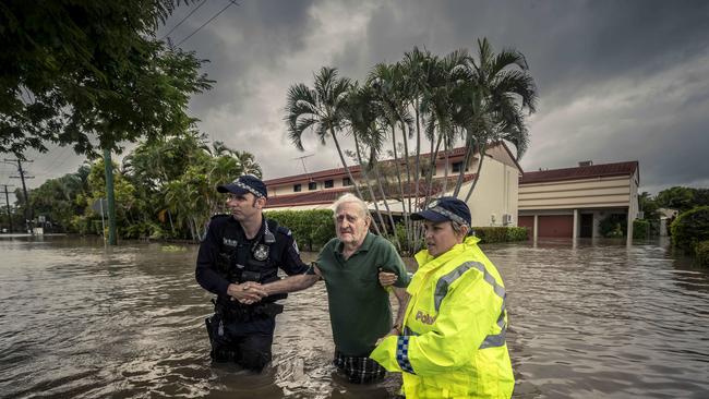 4th February 201982 year-old Terry Rowland is rescued from his flooded home in Hermit Park, Townsville.Photo: Glenn Hunt / The Australian