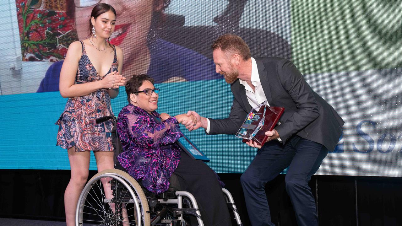 CEO of Sommerville Community Services, Lawson Broad, presenting the Sommerville Community Services Award to Amy James at the NT Young Achiever Awards. Picture: Pema Tamang Pakhrin