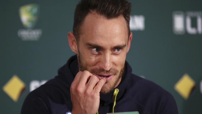 Faf du Plessis pretends to lick his little finger after being found guilty and fined for ball tampering during the 2016 series.