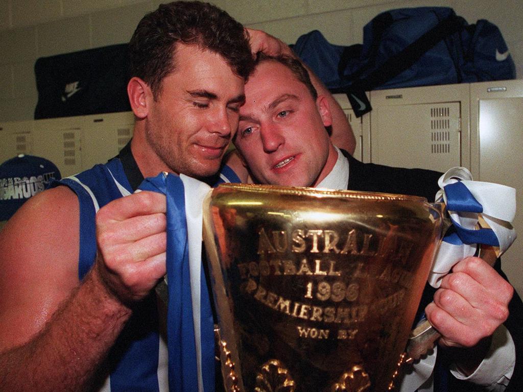 Wayne Carey and John Longmire with the 1998 premiership cup.