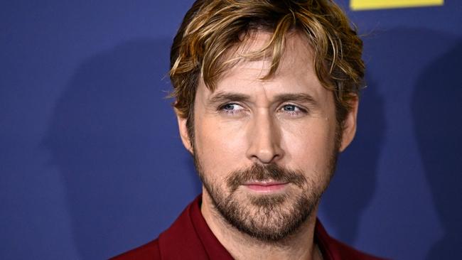 Canadian actor Ryan Gosling poses as he arrives for the premiere of 