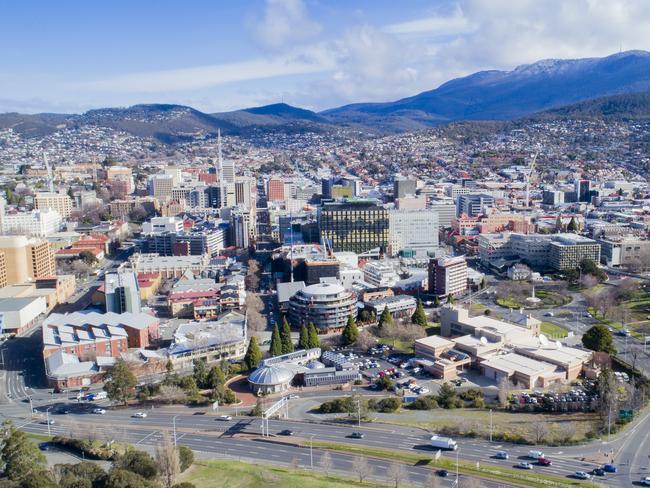 Hobart aerial showing new Remembrance Bridge, ABC ( Railway ) roundabout and the CBD. Mt Wellington with snow. Menzies / Macquarie Street / File / Generic / Drone