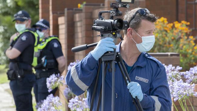 Forensic police gathering evidence. Picture: David Geraghty