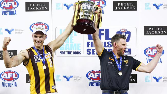 Andrew Moore lifts the 2018 VFL premiership with Box Hill coach Chris Newman. Picture: Michael Dodge/AFL Media/Getty Images