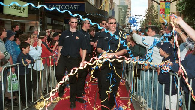 Adelaide 36ers title-winning players are greeted by fans in Rundle Mall.