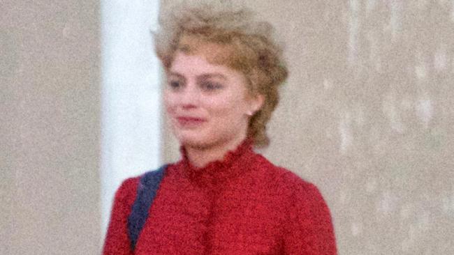 GROUP WEB AND PRINT RIGHTS - ONE TIME USE ONLY - FEE APPLIES - AU_595729 - *PREMIUM-EXCLUSIVE* ** RESTRICTIONS: ONLY AUSTRALIA, NEW ZEALAND ** - AG_164351 - *EXCLUSIVE* Atlanta, GA - Margot Robbie was barely recognizable on the set of â€œI, Tonyaâ€™â€™ as she was spotted in a new mullet type wig and head to toe red while filming with Sebastian Stan and Allison Janney. Margot was also seen earlier walking around the set wearing her wedding ring and black hoodie. Her husband Tom Ackerley is the producer of the upcoming film and has been working closely with her on the project. **SHOT ON 1/21/17** Backgrid Australia 23 JANUARY 2017 BYLINE MUST READ: AKM-GSI / Backgrid For content licensing please contact BackGrid Australia at: Phone: +61 2 9212 2622 / +61 410 818 463 Email: photos@backgrid.com.au