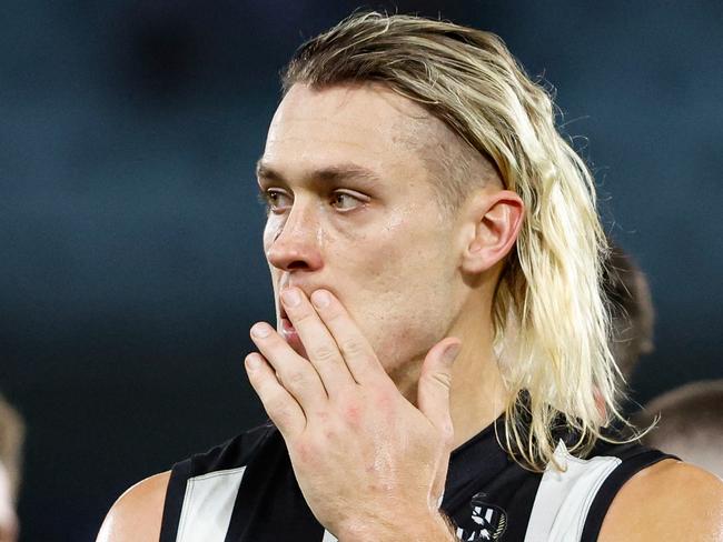 MELBOURNE, AUSTRALIA - MAY 31: Darcy Moore of the Magpies looks dejected after a loss during the 2024 AFL Round 12 match between the Collingwood Magpies and the Adelaide Crows at The Melbourne Cricket Ground on May 31, 2024 in Melbourne, Australia. (Photo by Dylan Burns/AFL Photos via Getty Images)