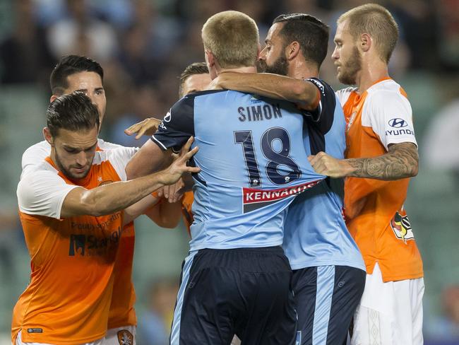 Matt Simon grabs Avram Papadopoulos after the Roar player spat at him.