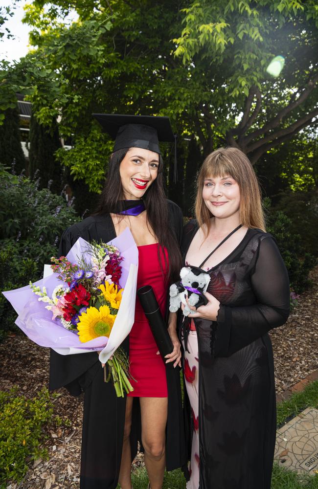 Bachelor of Laws graduate Jazmine Cowling celebrates with sister Jemma Strange at a UniSQ graduation ceremony at The Empire, Wednesday, October 30, 2024. Picture: Kevin Farmer