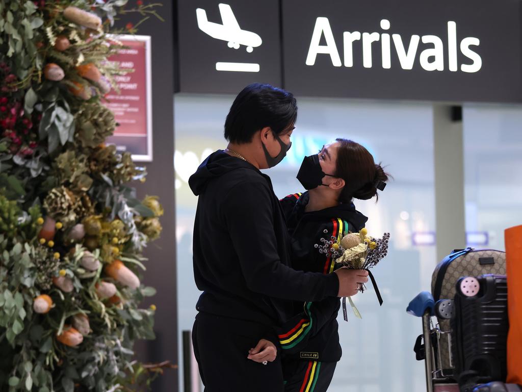 Returning international passengers were greeted on arrival at Perth Airport on Thursday. Picture: Paul Kane/Getty Images