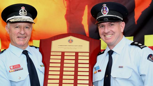 FRNSW Commissioner Greg Mullins presents the Commissioner's Award to Castle Hill fireman and Fire and Rescue NSW station officer Brett Johnson.