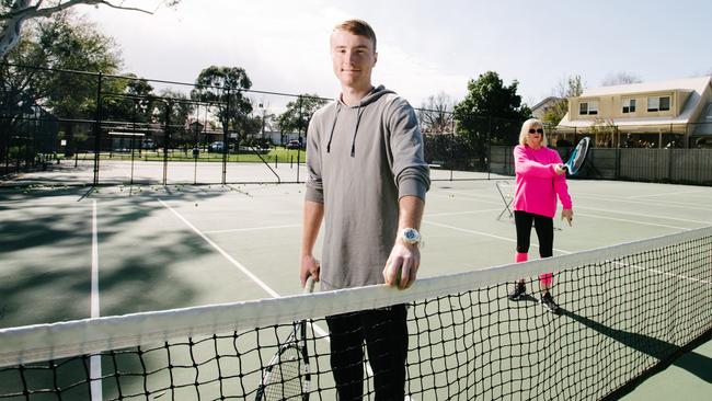 Tennis coach Scott Pearse trains with Fernanda Di Villarosa at tennis courts in Tusmore Park. Picture: AAP / Morgan Sette