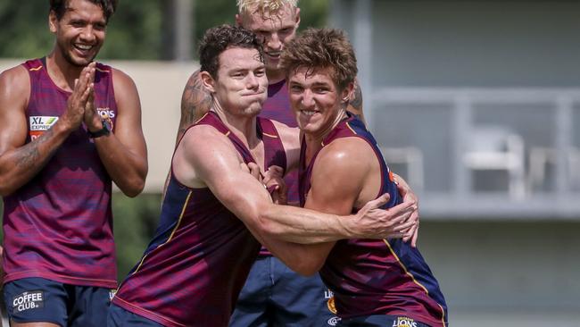 Lachie Neale and Deven Robertson battle at pre-season training.