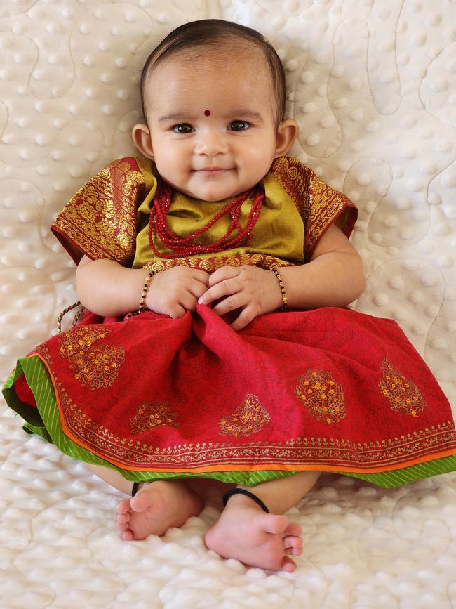 Aanshi Patel. Three months old. She can imitate the sound at the age of three months, also, loves tummy time.
