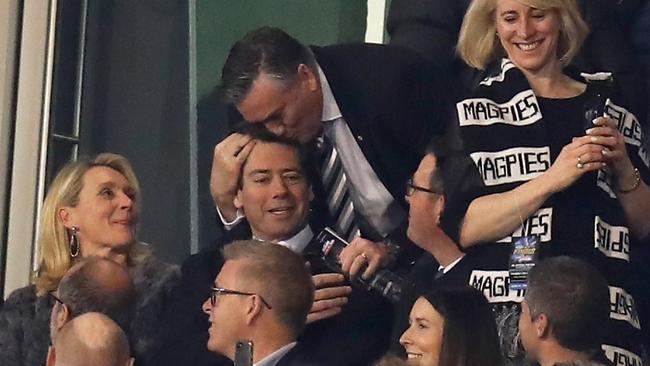 Magpies president Eddie McGuire kisses AFL chief Gillon McLachlan. Picture: AFL Media