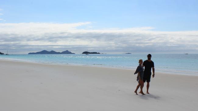 Chris and Elsa at Whitehaʋen Beach in the Whitsundays.
