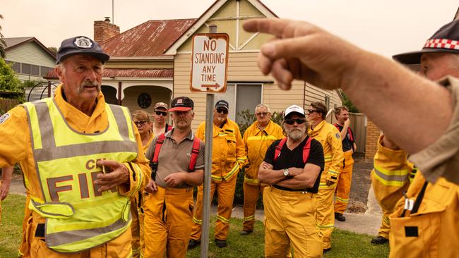 Firefighters at a briefing outside the Glenthompson fire station as they prepare to defend the town from potential spotfires on Thursday.