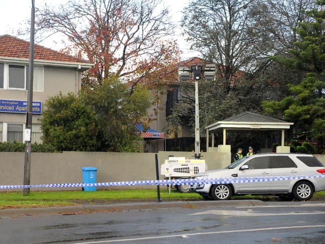 A police cordon at the scene of a shootout. Picture: Mal Fairclough.