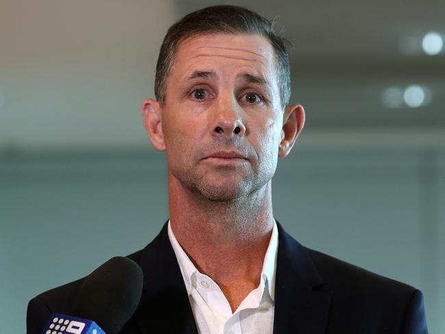 ARL Commissioner Mark Coyne speaks to the media at Qantas domestic terminal in Sydney after arriving home from Singapore where he was arrested by local police after an expletive laden rant during a drunken night out. Picture: Toby Zerna