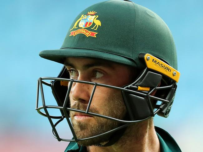 Australian cricketer Glenn Maxwell leaves the field after being dismissed by Pakistani cricketer Junaid Khan during the fifth one day international (ODI) cricket match between Pakistan and Australia at Dubai International Stadium in Dubai on March 31, 2019. (Photo by MAHMOUD KHALED / AFP)