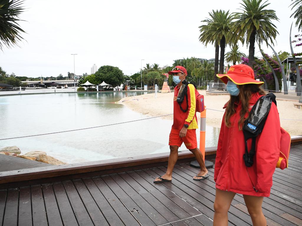 Lifeguards secure an empty Southbank beach. Picture: NCA NewsWire / Dan Peled