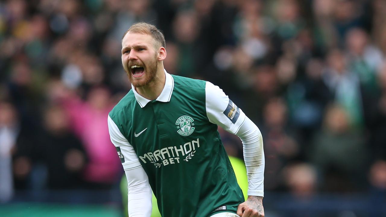 Martin Boyle of Hibernian celebrates scoring a penalty during the penalty shoot out during the Scottish Cup Semi Final between Hibernian and Dundee United