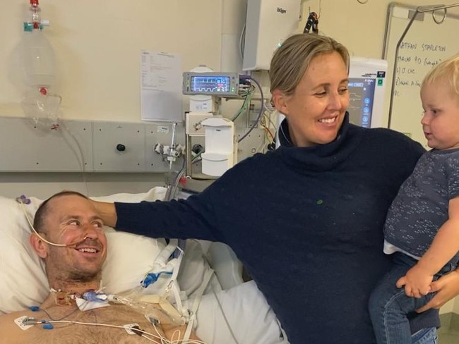 Nathan Stapleton has been diagnosed a quadriplegic after a rugby union accident. He could have died if it wasn’t for the quick thinking action of nurse Louise McCabe. Here he is pictured with his wife Kate and son Harry. Picture: Supplied