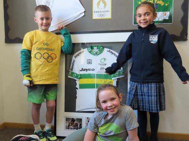 Georgia Baker's second cousins Archie Dawson, Isla Smith (front) and Maggie Cullen, all seven at Perth Primary's 'Baker Olympic shrine'. Picture: Jon Tuxworth