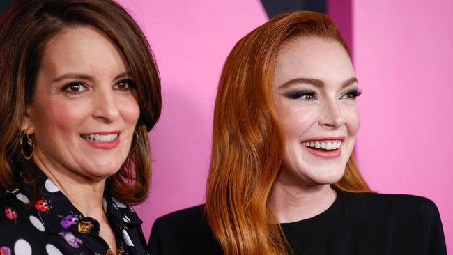 Lohan (R) with Tina Fey at the premiere of the new Mean Girls musical. Lohan wasn’t happy with what she saw on screen. Picture: AFP