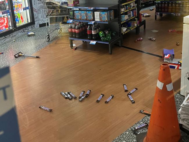 The items sprawled on the service station floor after three teens allegedly rampaged through on Tuesday night. Picture: Floss Adams.