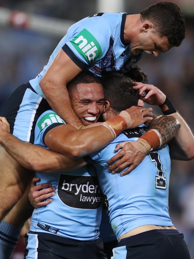 Nathan Cleary and Tyson Frizell celebrate a try. Picture: Brett Costello