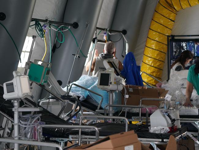 Medical supplies and beds are seen inside a tent as a temporary hospital is set up in New York’s Central Park. Picture: AFP