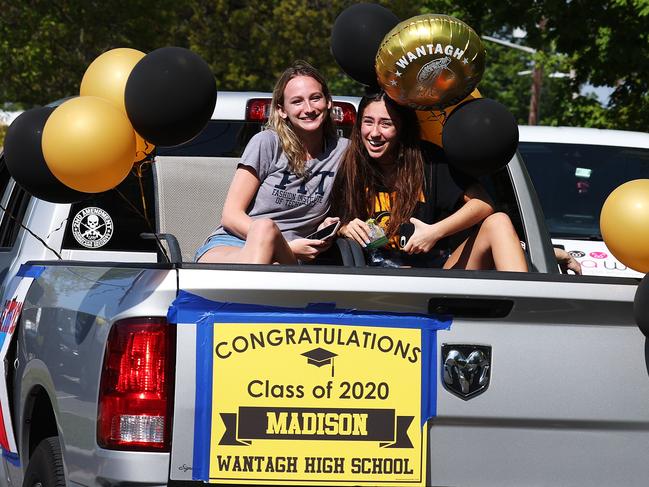 Graduating Seniors from Wantagh High School, NY drive by the front of the school in a Class of 2020 Parade. Picture: Al Bello/Getty Images/AFP