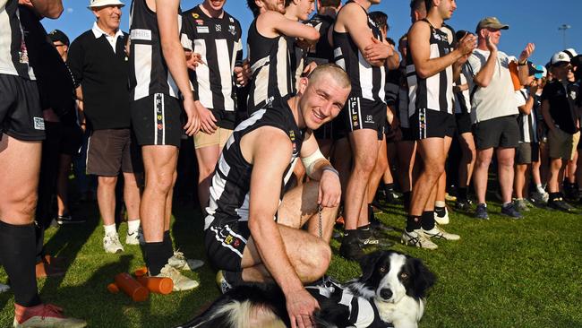 Hahndorf player Troy Parker-Poers with dog Jasper after the 2018 grand final. Picture: Tom Huntley