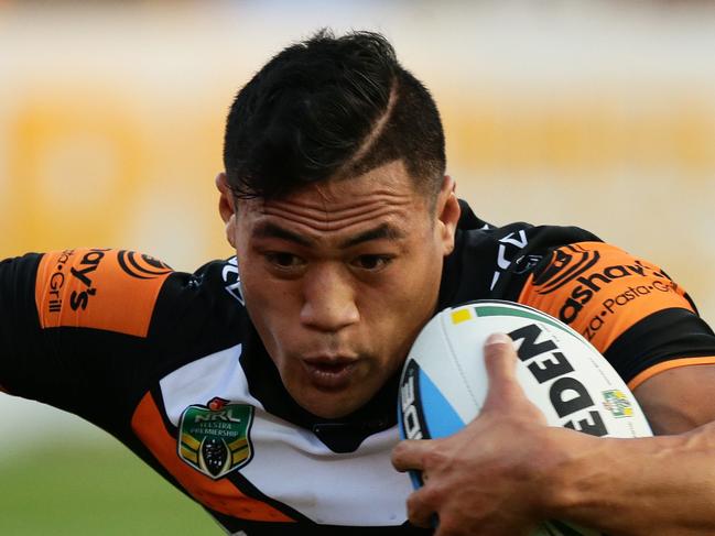 Tigers Tim Simona is tackled during the Wests Tigers v Penrith rugby league game at Leichhardt Oval, Sydney. Pic Brett Costello