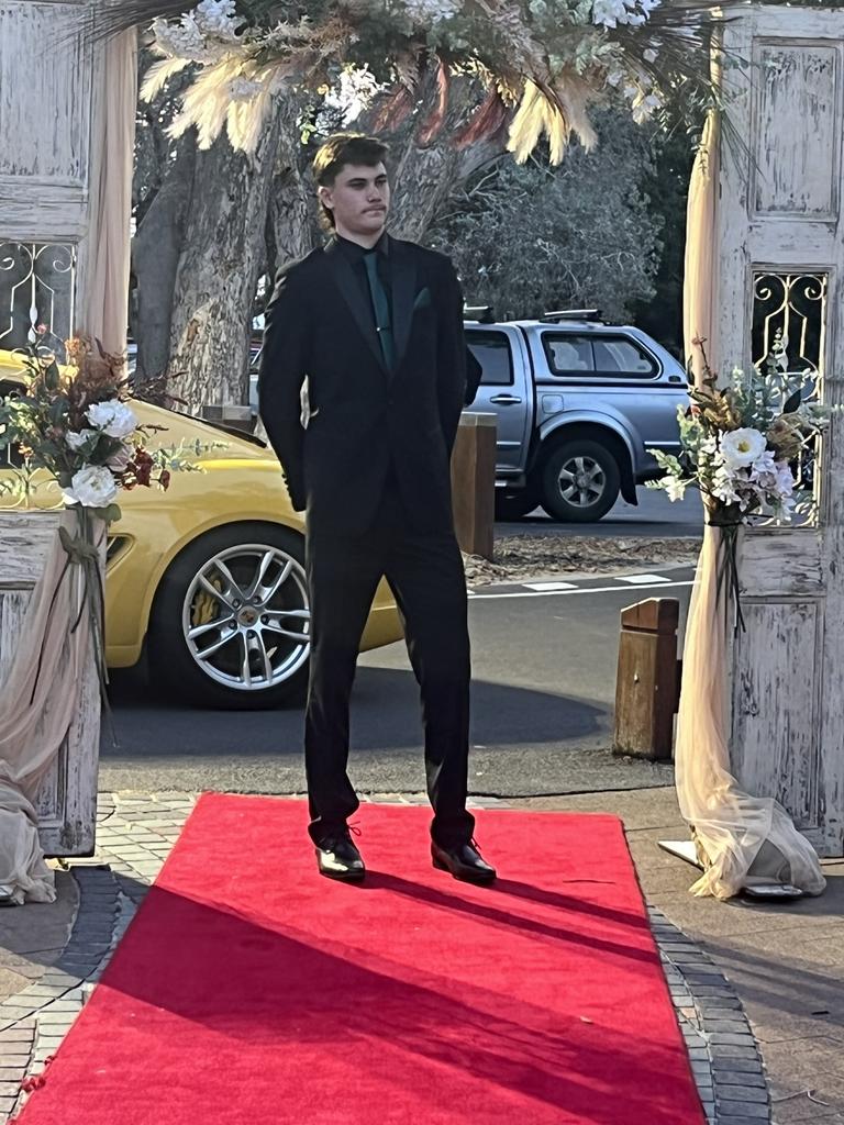 Lachlan Crack arrives at Hervey Bay State High School's formal.
