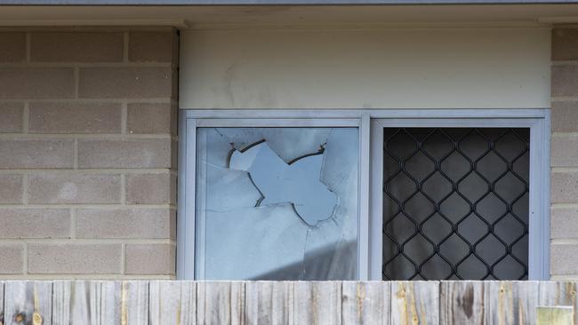 A broken window at the Killara Bvd home. Picture: Renae Droop