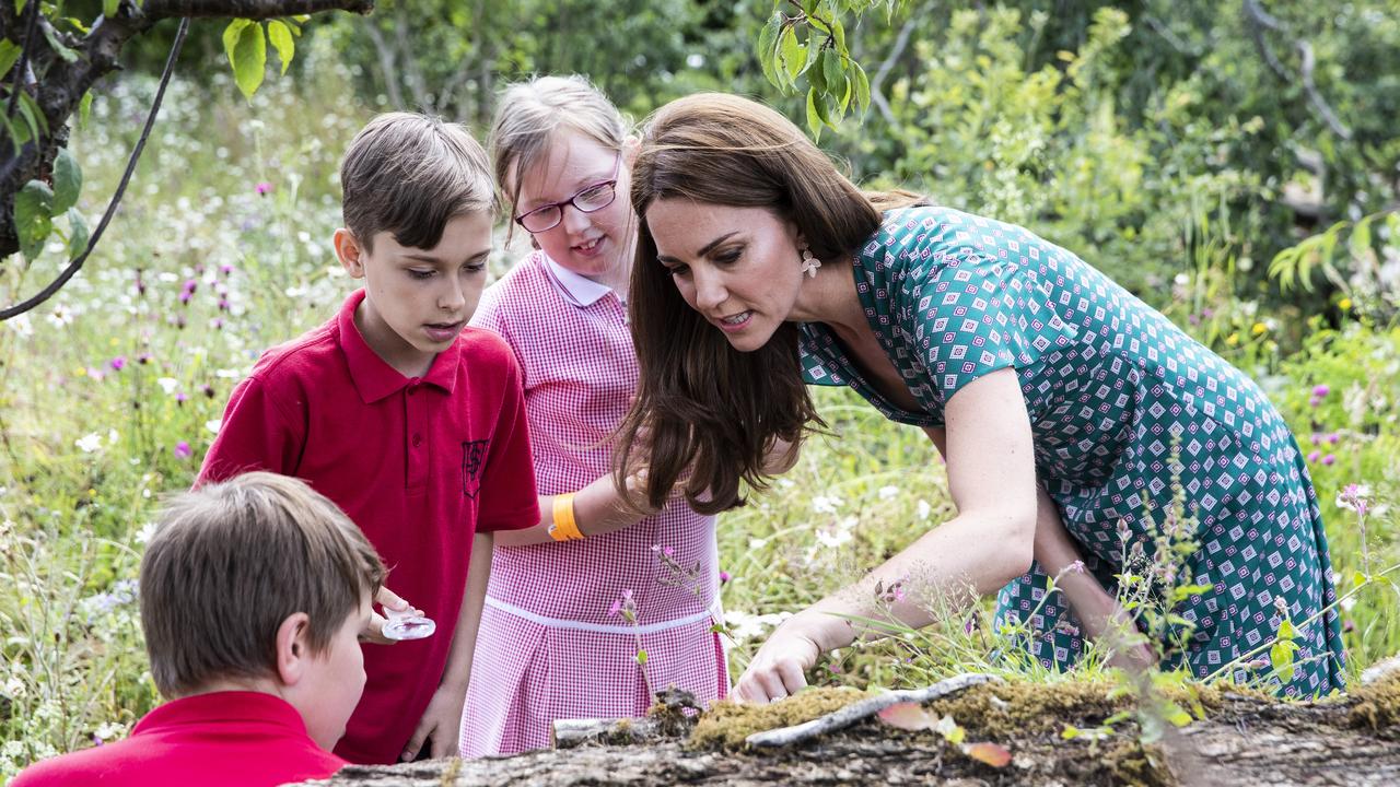 The royal helped them search for bugs in the garden. Picture: Heathcliff O'Malley — WPA Pool/Getty Images