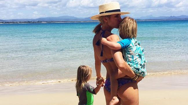 Pataky on the beach in Australia with two of her children. Picture: Instagram