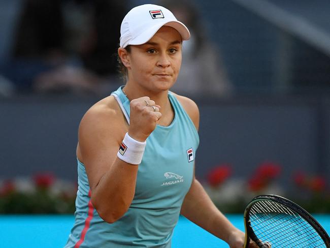 Australia's Ashleigh Barty celebrates winning a point against Poland's Iga Swiatek during their 2021 WTA Tour Madrid Open tennis tournament singles match at the Caja Magica in Madrid on May 3, 2021. (Photo by OSCAR DEL POZO / AFP)