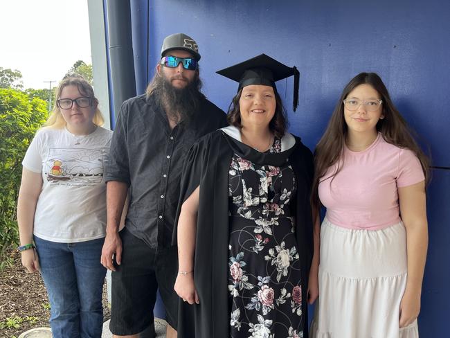 Graduates from the University of the Sunshine Coast's Fraser Coast campus celebrating at the Brolga Theatre.