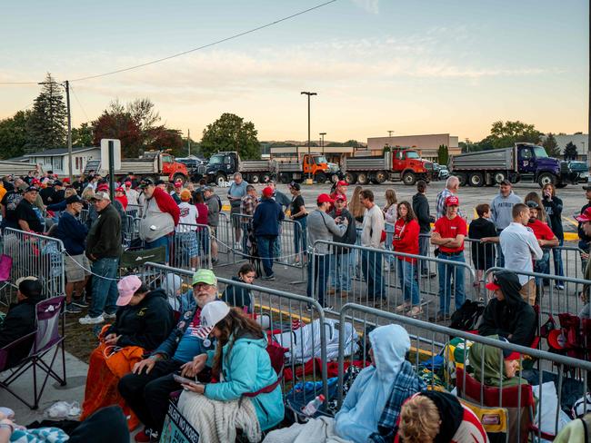 Donald Trump supporters line up at dawn to see the former president at a campaign stop in Wisconsin. Picture: Getty Images via AFP