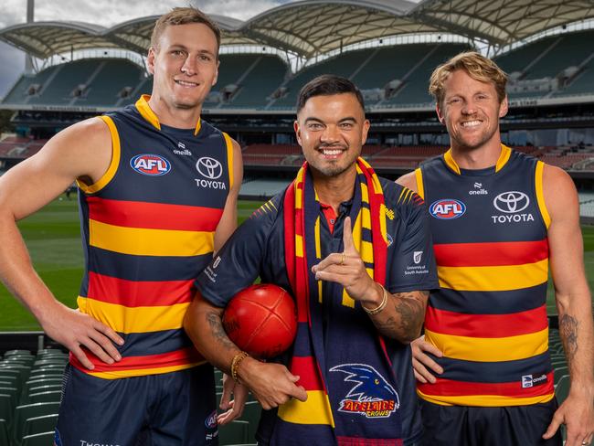 Crows Captain Jordan Dawson and Rory Sloane with Guy Sebastian . Picture: Sarah Reed Photography