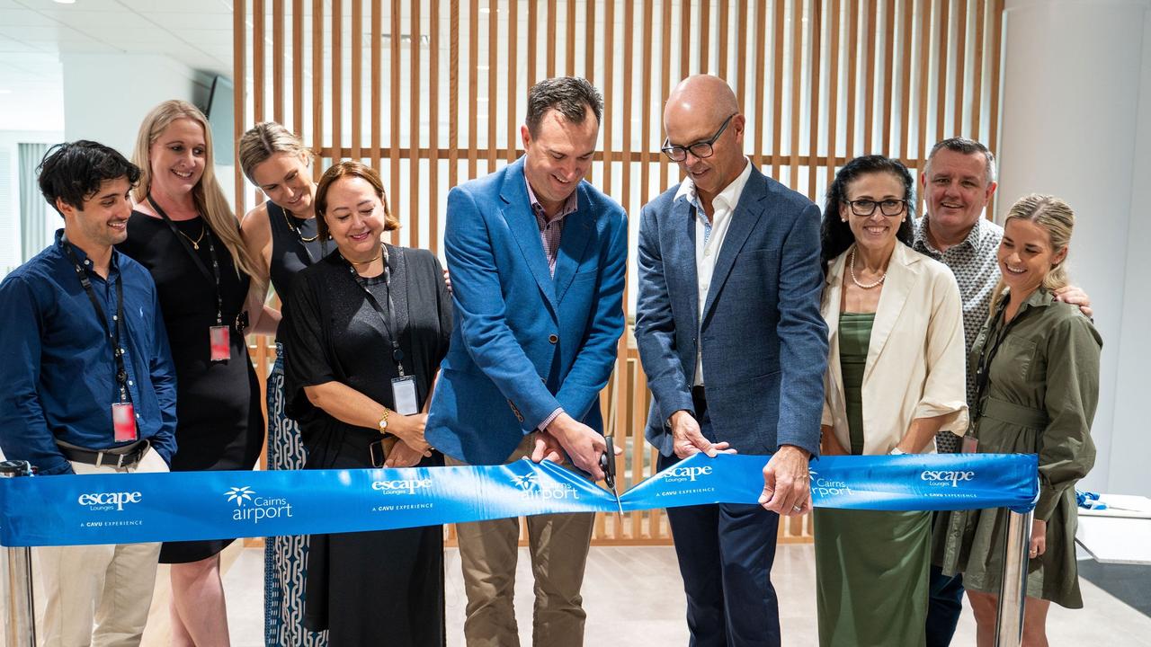 CAVU Vice President for Growth, Craig Pringle, and Cairns Airport CEO, Richard Barker, along with team members, celebrate the official opening of Escape Lounges in Cairns Airport’s international terminal on March 20. Picture: Supplied