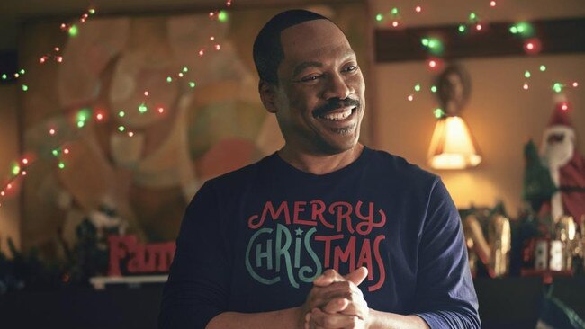 Eddie Murphy signs his life away in Candy Cane Lane Picture: Amazon